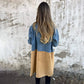 Mid-length trench coat with denim jeans seams