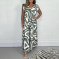 👗52% OFF NOW ! ✨Women's Ruffled Wide‑Leg Jumpsuit – Geometric Print V‑Neck One‑Piece Outfit